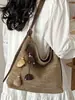 Bolsa Tejida de Retazos Elegante de Moda Verano 2026 Bolso de Hombro Casual de Paja Bolso Cruzado de Playa Ins