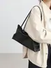 Nuevo producto 2026: diseño de nicho, bolso de hombro de cuero minimalista, bolso tote, bolso baguette moderno y casual para mujer
