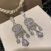Pendientes Coreanos de Moda con Zirconia en Forma de Corazón y Borla de Gota de Agua Pendientes Transfronterizos Europeos y Americanos Pendientes de Lujo Ligero de Gama Alta de Nicho para Mujer