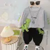 Coreano Nuevo Primavera Manga Larga Dibujos Animados Estampado Animal Dos Piezas Conjunto Bebé Hombres y Mujeres Elegante Moda Traje Deportivo Tendencia