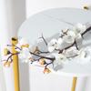 Flor de ciruelo artificial decorativa clásica china garra de ciruela roja seca flor de ciruelo de invierno decorativa flor falsa venta al por mayor transfronteriza