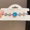 Pulsera de Brazalete con Colgante Ovalado de Circonita Super Brillante Pulsera de Temperamento de Lujo Ligero Gama Alta Diseño de Moda de Nicho Joyería de Mano para Mujeres