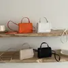 Bolsa de mão versátil, prática e estilosa, com design único e moderno, para o dia a dia, nova coleção outono 2026, bolsa pequena quadrada de ombro e transversal