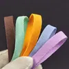Venta al por mayor del fabricante 1600 colores cinta de espiga elástica alta de 1 cm, accesorios de cincha para ribete de cuello trasero de ropa y ribetes