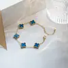 Bestseller transfronterizo 13MM cadena doble cara versátil de alta gama dorada trébol de cuatro hojas pulsera de cinco flores, no se decolora, pulsera de lujo ligero