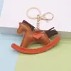 Crazy ins pônei pingente desenhos animados balanço cavalo pingente de couro pingente handmade bolsa de couro pendente carro chaveiro carro