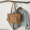 Bolso de mano tipo tote de nailon ligero, minimalista y de gran capacidad para mujer, nuevo estilo 2026, adecuado para uso casual y para ir al trabajo, se puede usar como bolso de hombro o bolso cruzado