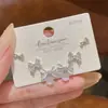 Pendientes de Ojo de Gato de Aguja Plateada de Cuatro Hojas para Mujer, Pendientes de Diseño Nicho, Joyería de Oreja Nueva Elegante y de Moda de Lujo Ligero de Gama Alta