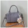Nuevo bolso de mano estilo dulce de moda coreana transfronterizo, bolso tipo almohada, versátil para ir al trabajo, con un toque de alta gama y elegancia, bolso cruzado para mujer