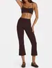 Conjunto de dos piezas para mujer estilo europeo y americano, con tirantes finos y pantalones acampanados cropped de cintura alta, sensación nude, fitness casual para correr, venta al por mayor