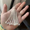 Broche de flecos hecho a mano con borlas, cuentas de concha natural, perlas de agua dulce, hebilla de corona, par de pendientes colgantes