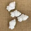Espuma pequeno animal pato amarelo Embrião branco som de chocalho pato Rede social esculpido desenho animado modelo de pato amarelo vendas diretas da fábrica