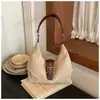 Bolsa de bolinho retrô da moda estilo coreano de grande capacidade em couro macio para mulheres, nova coleção outono/inverno 2026, bolsa de ombro versátil para o dia a dia