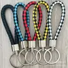 Llavero de cuerda de cuero trenzado simple creativo colgante de muñeca linda accesorios de llave para parejas tendencia regalos pequeños venta al por mayor