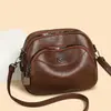 Bolso pequeño redondo transfronterizo, nueva moda 2024, bolso para madres de mediana edad, bolso cruzado de hombro para mujer, bolso para teléfono móvil de moda coreana que combina con todo.