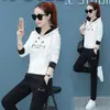 Conjunto de estilo casual de otoño: sudadera con capucha y cordón de manga larga bordada y pantalón de chándal jogger para mujer, conjunto de dos piezas, venta al por mayor transfronteriza