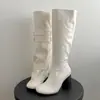 Botas altas para mujer con tacones altos gruesos para mujeres menudas, nuevo estilo otoño 2026, adecuadas para combinar con faldas, que realzan la altura, versátiles, adelgazantes y para piernas delgadas.