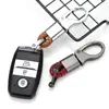 Llavero coche herrajes cuerda tejida metal colgante de alta gama hombres y mujeres parejas cuero de microfibra resistente al desgaste Accesorios Al por mayor