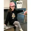 Camiseta Base de Dibujos Animados para Niñas Primavera y Otoño 2026, Nueva y Elegante Camiseta de Manga Larga Versión Coreana para Niñas