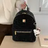Mochila de Luxo para Mulheres 2025 Nova Nicho Celebridade da Internet Bolsa Escolar Feminina Estudante Universitário Roupa de Trabalho Viagem Mochila com Estampa de Leopardo