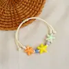 Jingdezhen Navidad Pulsera de Cuerda Trenzada de Cerámica Pulsera de Trébol de Cuatro Hojas Joyería Artística Hecha a Mano Venta al por Mayor Pulseras de Cerámica para Atracciones Turísticas