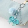 Dulce, Fresco y Versátil Estilo Pareja Bolas de Pelo Multicolor Ojo de Gato Perlas Estrella Acrílico Lazo Llavero Colgante para Bolso