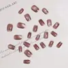 24 piezas de uñas postizas de color pasta de frijol, longitud corta, estilo ojo de gato, con borde dorado, parches de uñas de moda estilo ins transfronterizo
