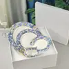Plato de hueso europeo de lujo ligero transfronterizo para filete estilo occidental decoración Mesa de sala modelo plato plano de hueso de china casero de hortensias