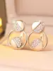 Aretes de Clip para Oreja de Doble Círculo Semi-Incustrados con Diamantes, Estilo Minimalista de Lujo Ligero para el Día a Día, Pendientes de Círculo Medio con Circonita