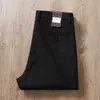 Pantalones casuales rectos de algodón modal refinado suave y cómodo de cintura media elástica para otoño e invierno, color caqui, de alta gama, ropa formal para mediana edad