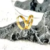 Venta caliente transfronteriza moda femenina estilo ins anillo de acero inoxidable con circonita incrustada chapado en oro anillo de titanio para pareja venta al por mayor