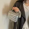 Bolso de mujer de alta gama 2026 nuevo de moda celebridad de internet superventas bolso de mano para el trabajo bolso bandolera de cadena acolchado bolso cuadrado pequeño