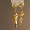 Pendientes largos de borla de metal de lujo, ligeros y retro, de nicho, exquisitos, de moda, con temperamento, joyería de oído de alto sentido, al por mayor