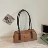 Bolso de axila de lujo ligero de alta gama para mujer, nuevo bolso de hombro versátil de moda retro de verano para el trabajo