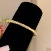 Pulseira de Ouro Real 18K Galvanizado Luxo Acessível com Zircônia e Fecho de Bambu Joia de Mão Elegante da Moda Estilosa de Nicho de Alto Padrão para Mulheres