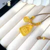 Novo Estilo Chinês Antigo Ouro de Areia Triângulo Amarelo Deus da Riqueza Pingente de Borla DIY Corrente de Suéter Tendência Nacional Acessório de Borla Vajra Pestle