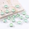 Corazón de melocotón moca cristal de proteína garra de garra de taladro de cuatro esquinas taladro de garra DIY ropa zapatos bolsa anillo intestinal accesorios de joyería al por mayor