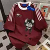 Camiseta de manga corta con diseño de letras estilo ins para mujer, con estampado de cachorro de tres rayas, top de algodón puro para pareja para hombre, diversión de primavera y verano