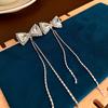 Brincos de Moda Coreana Personalidade Agulha de Prata com Laço de Strass Brilhante Longo em Franjas Venda por Atacado para Uso Diário