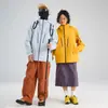 Nueva Chaqueta Rígida para Exteriores Tres en Uno para Mujer Otoño e Invierno Resistente al Frío Cálida Chaqueta de Pareja Ropa de Montañismo Xizang para Hombres
