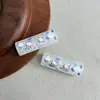 Cuentas cilíndricas de dos agujeros, translúcidas, con estampado de dibujos animados y polvo dorado, para cadenas y accesorios hechos a mano para bolsas de teléfono DIY