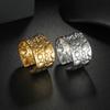 Anillo de acero de titanio con apertura tridimensional y presión de aceite, con diseño de nicho de joyería de acero inoxidable de moda transfronteriza.