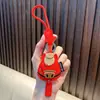Llavero de Mascota Rojo Colgante para Bolsa de Año Nuevo Llavero de Pareja para Coche Día de Año Nuevo Pequeño Regalo Al por Mayor