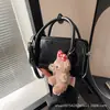 Moda Estilo Coreano Retro Bolso Cuadrado Pequeño para Mujer 2026 Nuevo Diseño Pequeño de Nicho Bolso de Mano Pequeño Bolso Cruzado Simple Versátil