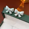 Pendientes de Acrílico con Lazo de Aguja Plateada Estilo Retro Francés Versátiles Elegantes Pendientes de Moda de Nicho para Mujer
