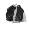 Conjunto de outfit de otoño para niño 2026 nuevo elegante chaqueta de cuero chaleco camisa de primavera y otoño conjunto de tres piezas ropa para niños