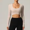 Roupas de Yoga Apertadas de Manga Longa Outono/Inverno Europeias e Americanas Femininas Camiseta Esportiva Respirável de Secagem Rápida Camada de Base para Corrida Fitness
