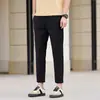 Pantalones casuales color café de Hong Kong para hombre, nuevo estilo primavera/verano, pantalones rectos ajustados cropped, pantalones de traje