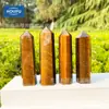 Venta al por mayor del fabricante Cristal de Ojo de Tigre Natural Prisma Hexagonal Columna de Punta Única Piedra Cruda Pulida Columna de Piedra de Energía Artesanías Adornos