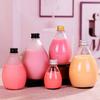 Venta al por mayor de fábrica botella de vidrio vacía para café de extracción en frío botella para bebida jugo botella para gotas de hielo agua salada botella para té botella para vino de frutas hogar